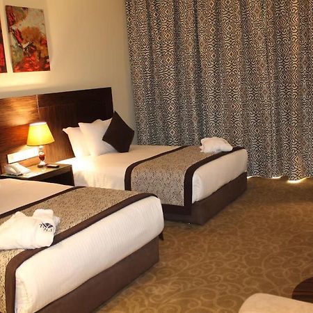 Tolip El Forsan Hotel Ismailia Exterior photo A room at the hotel
