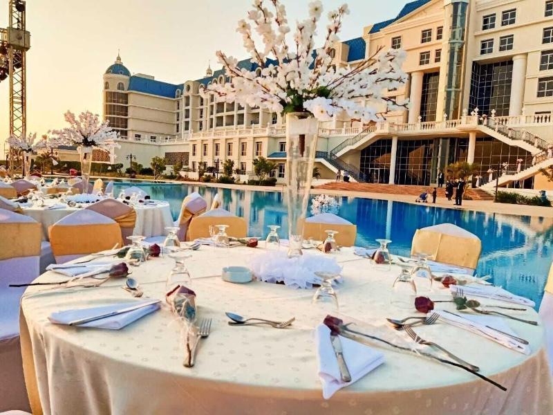 Tolip El Forsan Hotel Ismailia Exterior photo Wedding reception at the poolside