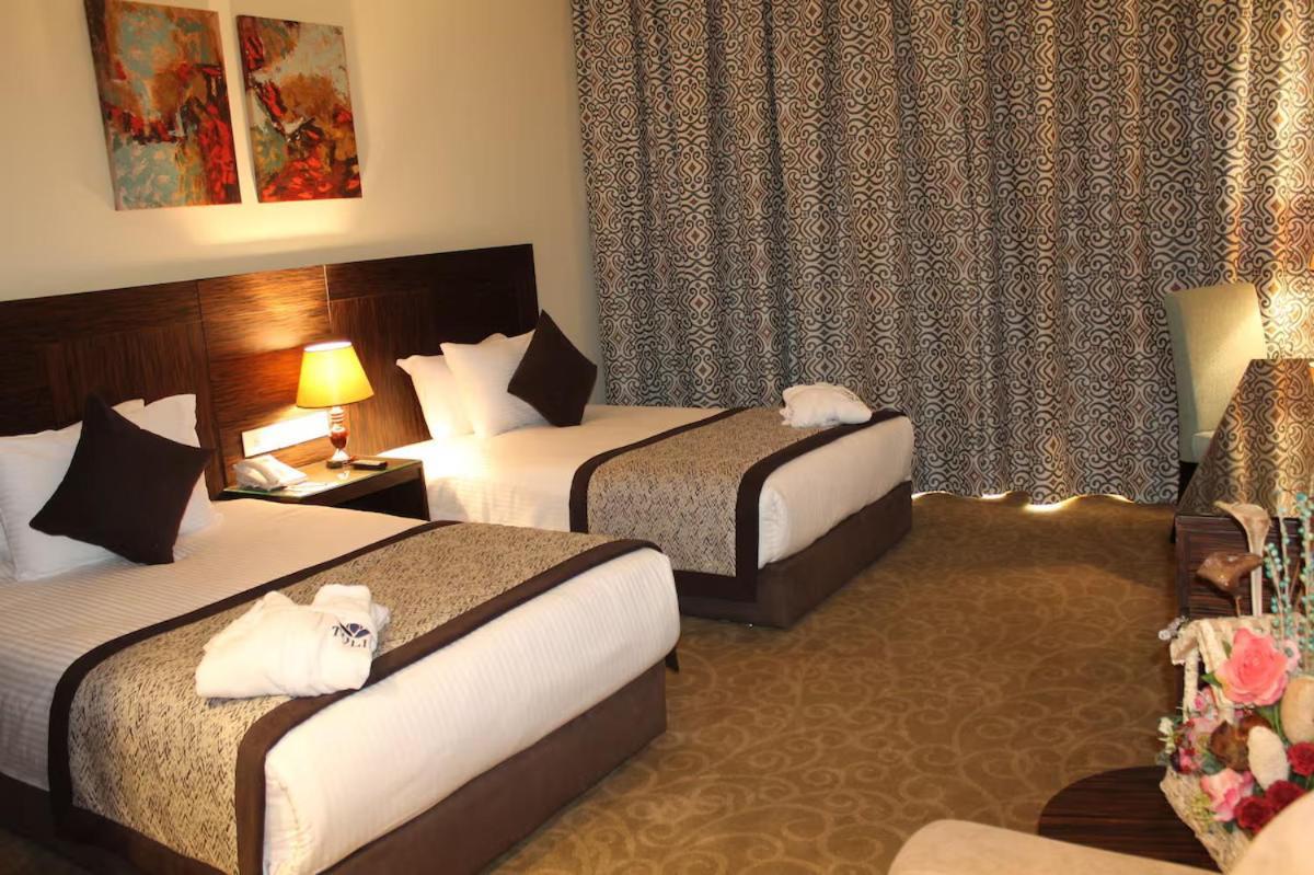 Tolip El Forsan Hotel Ismailia Exterior photo A room at the hotel